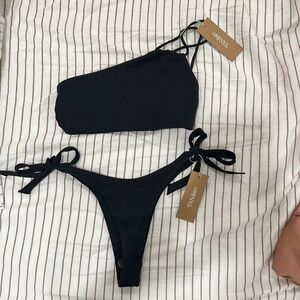 Tan lines black bikini in small
